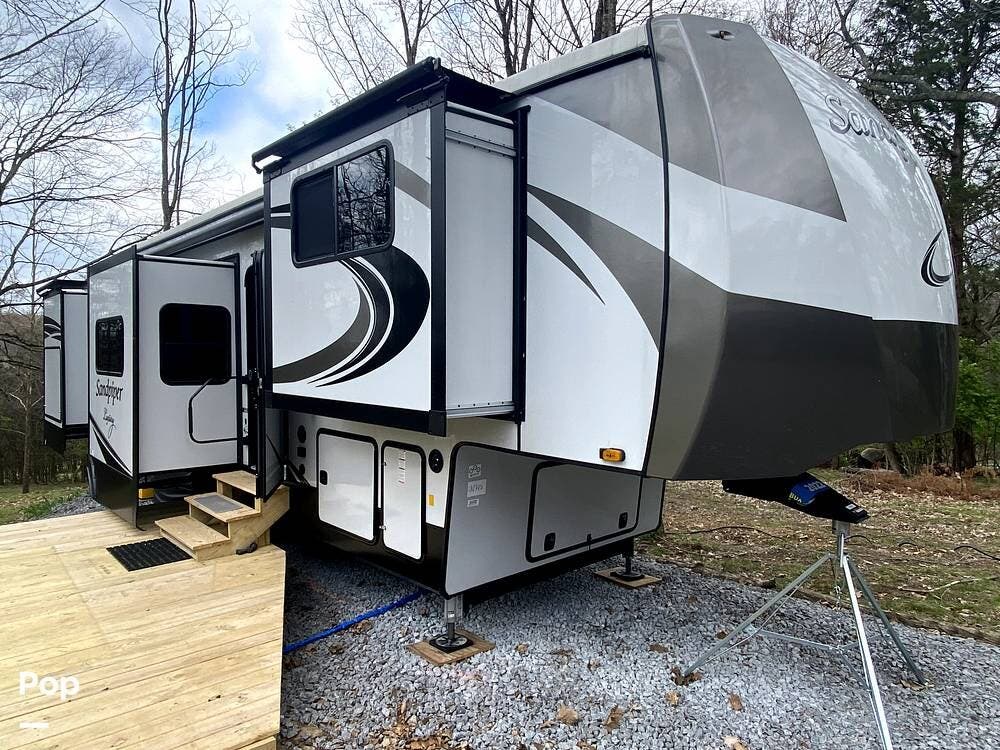 Call now about this 2022 Forest River Sandpiper 38FKOK! 2022 Forest River Sandpiper 38FKOK - Used Fifth Wheel For Sale by Pop RVs in Smyrna, Tennessee features Slideout, Air Conditioning, Awning, Leveling Jacks
