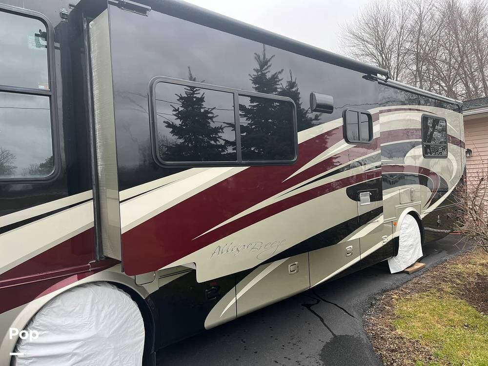 Contact us now about this 2013 Tiffin Allegro Breeze 32BR! 2013 Allegro Breeze 32BR by Tiffin from Pop RVs in Lockport, New York