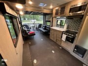 Call now about this 2021 Forest River Work & Play 21LT! 2021 Forest River Work & Play 21LT - Used Toy Hauler For Sale by Pop RVs in Lonsdale, Minnesota features Air Conditioning, Awning, Slideout, Leveling Jacks