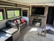 Call now about this 2021 Keystone Hideout 28RKS! 2021 Keystone Hideout 28RKS - Used Travel Trailer For Sale by Pop RVs in Lake City, Florida features Leveling Jacks, Air Conditioning, Slideout, Awning