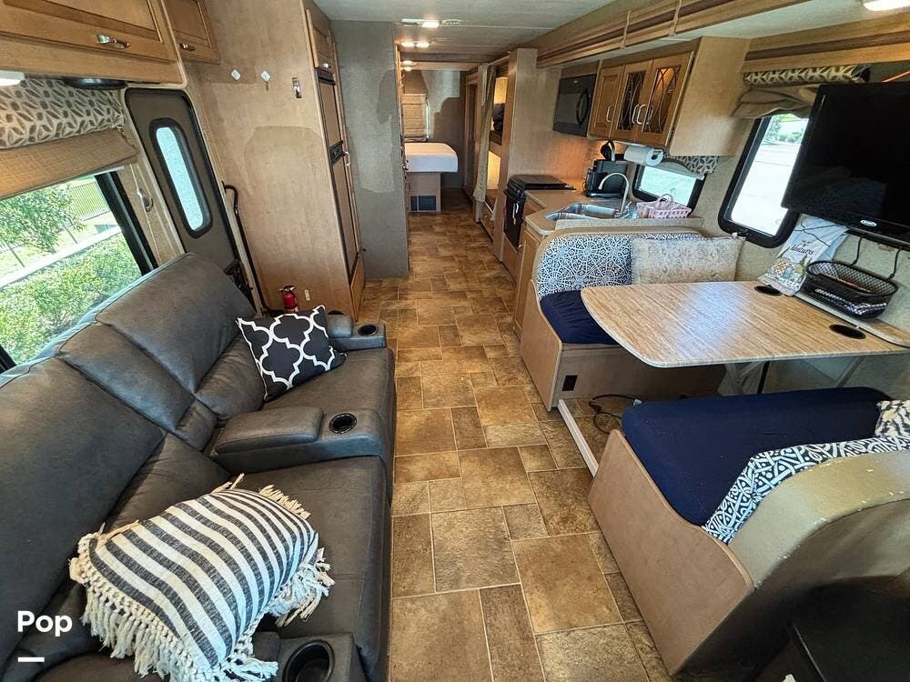 Call now about this 2016 Thor Motor Coach Hurricane 34J! 2016 Thor Motor Coach Hurricane 34J - Used Class A For Sale by Pop RVs in Winter Garden, Florida features Generator, Awning, Leveling Jacks, Slideout, Air Conditioning