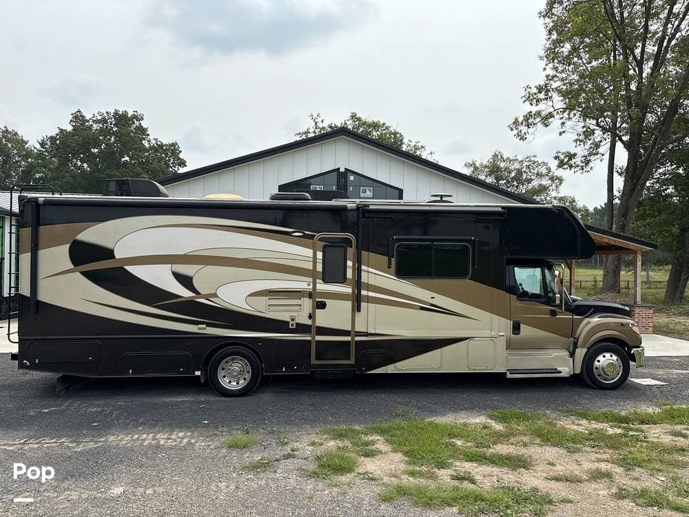 Call now about this 2016 Nexus Phantom 33SC! 2016 Nexus Phantom 33SC - Used Super C For Sale by Pop RVs in Ravena, New York features Slideout, Leveling Jacks, Air Conditioning, Awning, Generator