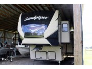 Call now about this 2020 Forest River Sandpiper 33RLIK! 2020 Forest River Sandpiper 33RLIK - Used Fifth Wheel For Sale by Pop RVs in Fort Meade, Florida features Slideout, Leveling Jacks, Awning, Air Conditioning