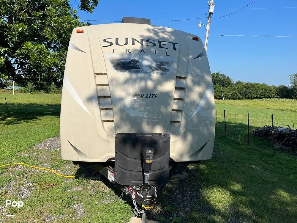 Call now about this 2017 CrossRoads Sunset Trail 320BH! 2017 CrossRoads Sunset Trail 320BH - Used Travel Trailer For Sale by Pop RVs in Searcy, Arkansas features Air Conditioning, Awning, Slideout