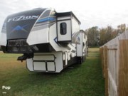 Call now about this 2021 Keystone Fuzion 419! 2021 Keystone Fuzion 419 - Used Toy Hauler For Sale by Pop RVs in Jacksonville, North Carolina features Generator, Awning, Leveling Jacks, Air Conditioning, Slideout