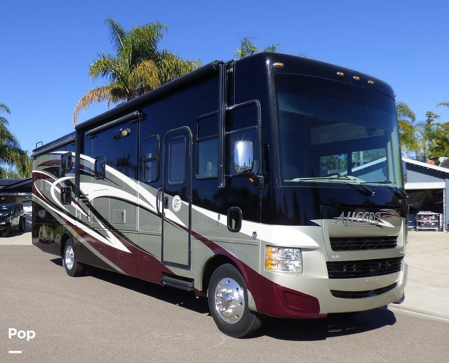 Call now about this 2014 Tiffin Allegro Open Road 35 QBA! 2014 Tiffin Allegro Open Road 35 QBA - Used Class A For Sale by Pop RVs in Carlsbad, California features Generator, Air Conditioning, Awning, Slideout