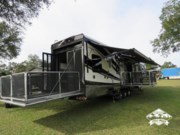 Call now about this 2016 DRV Full House TX500! 2016 DRV Full House TX500 - Used Toy Hauler For Sale by Pop RVs in Ocala, Florida features Slideout, Air Conditioning, Leveling Jacks, Generator, Awning