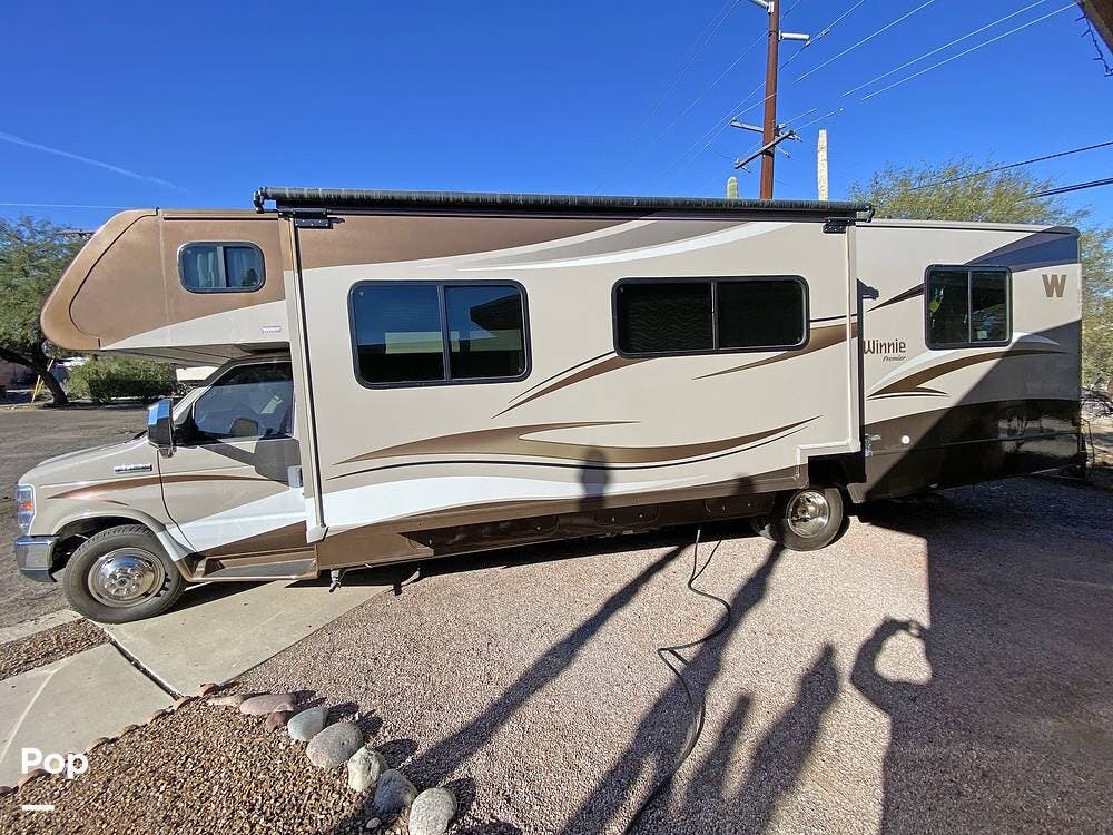 Call now about this 2014 Winnebago Minnie Winnie M-31KP Premier! 2014 Winnebago Minnie Winnie M-31KP Premier - Used Class C For Sale by Pop RVs in Tucson, Arizona features Slideout, Leveling Jacks, Air Conditioning, Generator, Awning