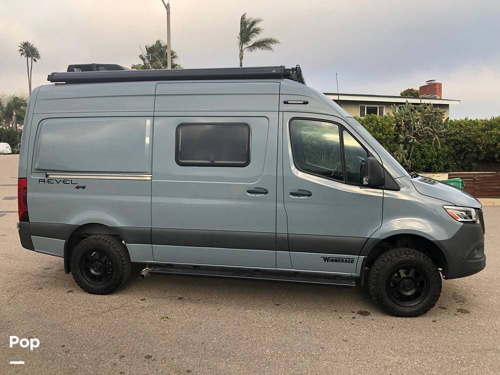 Call now about this 2022 Winnebago Revel 44E 4x4! 2022 Winnebago Revel 44E 4x4 - Used Class B For Sale by Pop RVs in San Diego, California features Awning, Air Conditioning