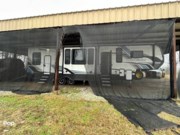 Call now about this 2021 Keystone Carbon 348! 2021 Keystone Carbon 348 - Used Toy Hauler For Sale by Pop RVs in Idabel, Oklahoma features Slideout, Air Conditioning, Awning, Generator