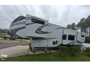Call now about this 2022 Grand Design Solitude 390RK! 2022 Grand Design Solitude 390RK - Used Fifth Wheel For Sale by Pop RVs in Jacksonville, Florida features Generator, Leveling Jacks, Air Conditioning, Awning, Slideout