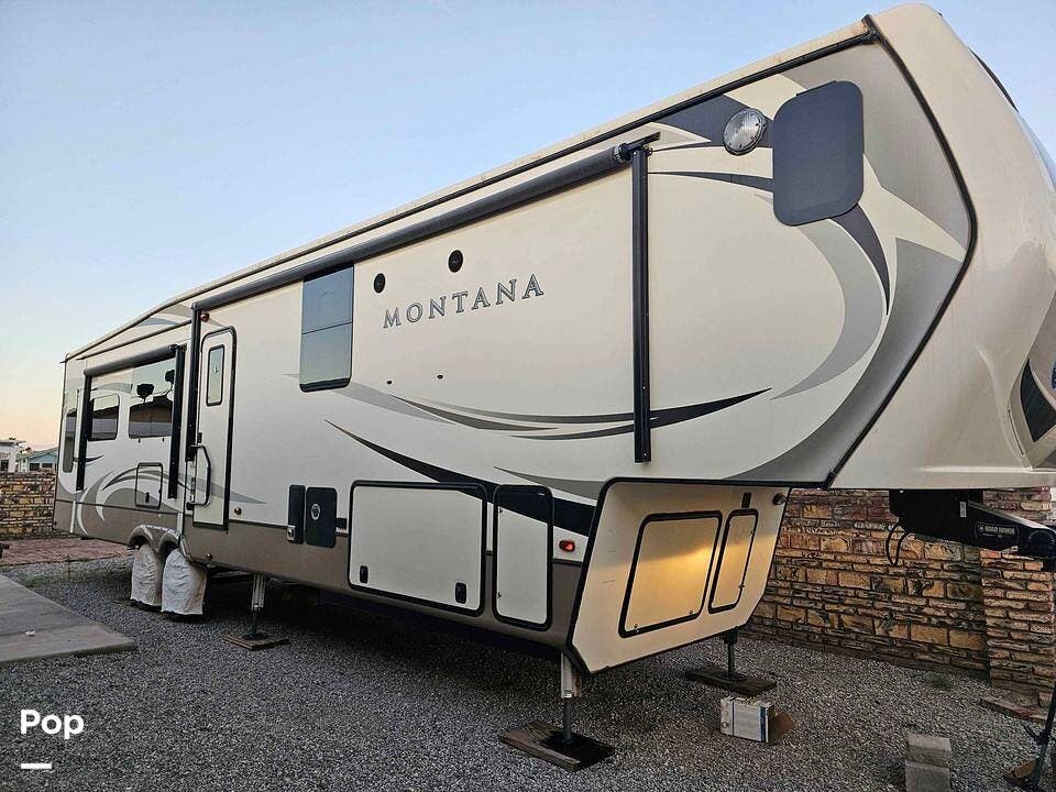 Call now about this 2018 Keystone Montana Legacy 3920FB! 2018 Keystone Montana Legacy 3920FB - Used Fifth Wheel For Sale by Pop RVs in Pea Ridge, Arkansas features Air Conditioning, Leveling Jacks, Awning, Slideout