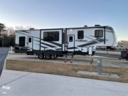Call now about this 2020 Keystone Fuzion Impact 367! 2020 Keystone Fuzion Impact 367 - Used Toy Hauler For Sale by Pop RVs in Polk City, Florida features Air Conditioning, Leveling Jacks, Awning, Generator, Slideout