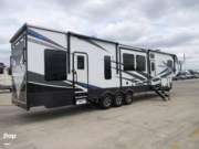 Call now about this 2021 Keystone Fuzion 419! 2021 Keystone Fuzion 419 - Used Toy Hauler For Sale by Pop RVs in Kyle, Texas features Leveling Jacks, Awning, Slideout, Generator, Air Conditioning