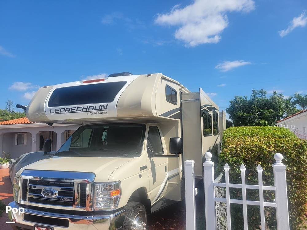 Call now about this 2022 Coachmen Leprechaun 319MB! 2022 Coachmen Leprechaun 319MB - Used Class C For Sale by Pop RVs in Miami, Florida features Awning, Air Conditioning, Generator, Slideout