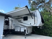 Call now about this 2022 Forest River Cedar Creek 311RL! 2022 Forest River Cedar Creek 311RL - Used Fifth Wheel For Sale by Pop RVs in Clermont, Florida features Air Conditioning, Leveling Jacks, Awning, Slideout, Generator