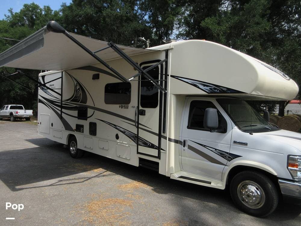 Call now about this 2017 Jayco Greyhawk 29MV! 2017 Jayco Greyhawk 29MV - Used Class C For Sale by Pop RVs in Lithia, Florida features Air Conditioning, Leveling Jacks, Slideout, Generator, Awning