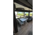 Call now about this 2021 Grand Design Solitude 3550BH-R! 2021 Grand Design Solitude 3550BH-R - Used Fifth Wheel For Sale by Pop RVs in Argyle, Texas features Air Conditioning, Awning, Leveling Jacks, Generator, Slideout