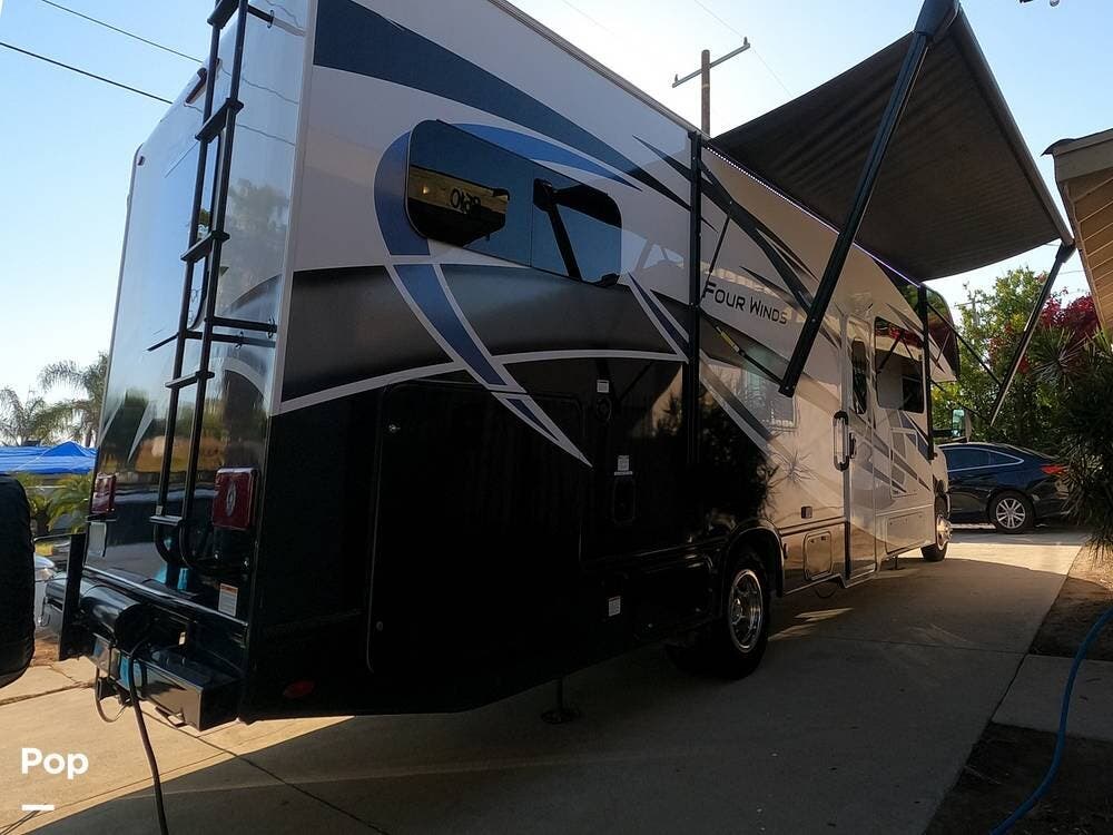 Call now about this 2023 Thor Motor Coach Four Winds 31W! 2023 Thor Motor Coach Four Winds 31W - Used Class C For Sale by Pop RVs in Sun Valley, California features Slideout, Air Conditioning, Generator, Awning, Leveling Jacks