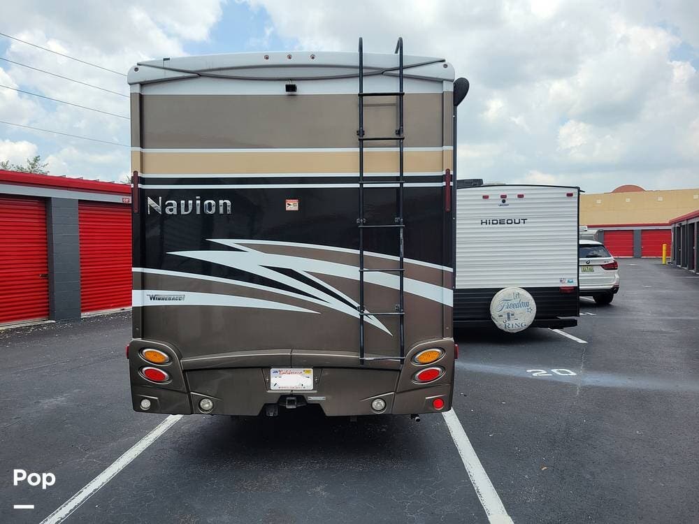 Call now about this 2017 Winnebago Navion 24J! 2017 Winnebago Navion 24J - Used Class C For Sale by Pop RVs in Miami, Florida features Awning, Generator, Air Conditioning, Slideout