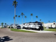 Call now about this 2022 Grand Design Imagine 3250BH! 2022 Grand Design Imagine 3250BH - Used Travel Trailer For Sale by Pop RVs in North Fort Myers, Florida features Leveling Jacks, Awning, Air Conditioning, Slideout