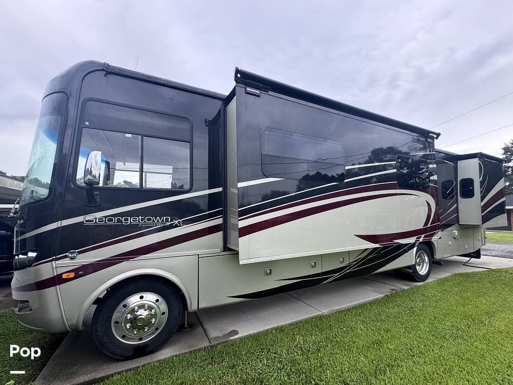 Call now about this 2015 Forest River Georgetown 377TS XL series! 2015 Forest River Georgetown 377TS XL series - Used Class A For Sale by Pop RVs in Lafayette, Louisiana features Awning, Slideout, Air Conditioning, Generator, Leveling Jacks