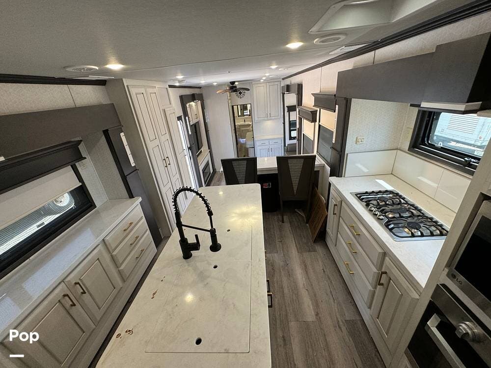 Call now about this 2021 DRV Mobile Suites 41FKMB! 2021 DRV Mobile Suites 41FKMB - Used Fifth Wheel For Sale by Pop RVs in Payson, Utah features Slideout, Awning, Leveling Jacks, Air Conditioning