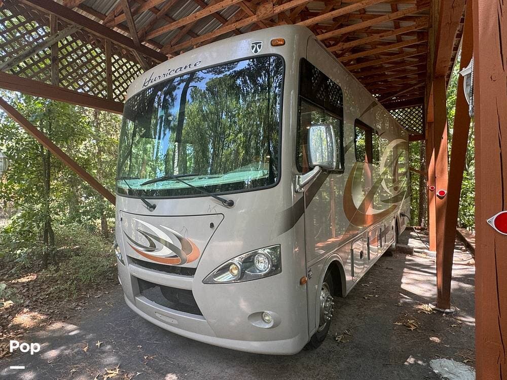 Call now about this 2015 Thor Motor Coach Hurricane 27K! 2015 Thor Motor Coach Hurricane 27K - Used Class A For Sale by Pop RVs in Eureka Springs, Arkansas features Slideout, Generator, Leveling Jacks, Air Conditioning, Awning
