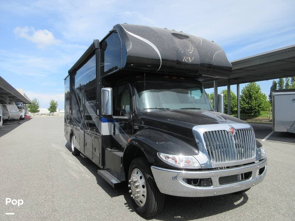 Call now about this 2022 Nexus Triumph 30TSC! 2022 Nexus Triumph 30TSC - Used Super C For Sale by Pop RVs in Lakeland, Florida features Generator, Slideout, Awning, Leveling Jacks, Air Conditioning
