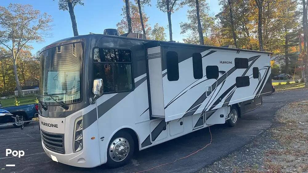 Call now about this 2023 Thor Motor Coach Hurricane 34J! 2023 Thor Motor Coach Hurricane 34J - Used Class A For Sale by Pop RVs in Auburn, Massachusetts features Air Conditioning, Generator, Slideout, Awning, Leveling Jacks