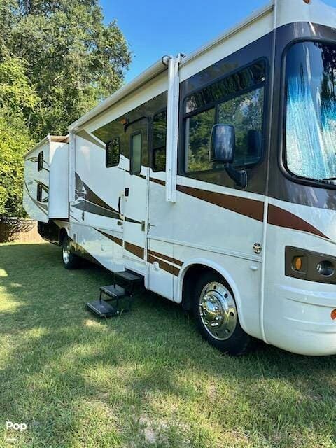 Call now about this 2011 Forest River Georgetown 350TS! 2011 Forest River Georgetown 350TS - Used Class A For Sale by Pop RVs in Gordon, Georgia features Leveling Jacks, Slideout, Generator, Awning, Air Conditioning