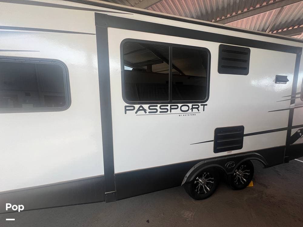 Contact us now about this 2021 Keystone Passport 229RK! 2021 Passport 229RK by Keystone from Pop RVs in Surprise, Arizona