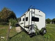 Call now about this 2021 Keystone Outback 221UMD! 2021 Keystone Outback 221UMD - Used Travel Trailer For Sale by Pop RVs in Baxter, Tennessee features Air Conditioning, Leveling Jacks, Slideout, Awning