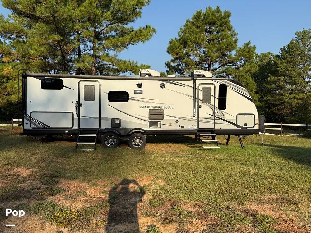Call now about this 2022 Jayco White Hawk 29BH! 2022 Jayco White Hawk 29BH - Used Travel Trailer For Sale by Pop RVs in Harleton, Texas features Air Conditioning, Leveling Jacks, Awning, Slideout