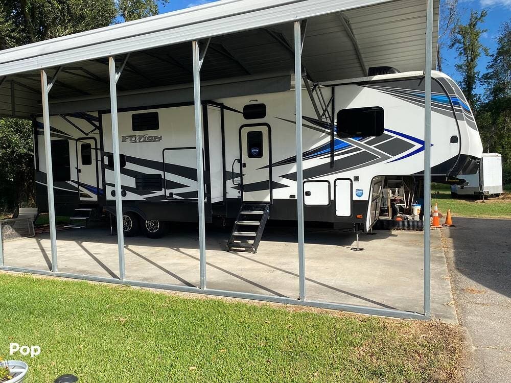 Contact us now about this 2021 Keystone Fuzion 379! 2021 Fuzion 379 by Keystone from Pop RVs in Albany, Louisiana
