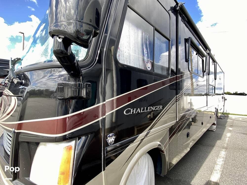 Call now about this 2014 Thor Motor Coach Challenger 37GT! 2014 Thor Motor Coach Challenger 37GT - Used Class A For Sale by Pop RVs in Winter Haven, Florida features Leveling Jacks, Slideout, Generator, Air Conditioning