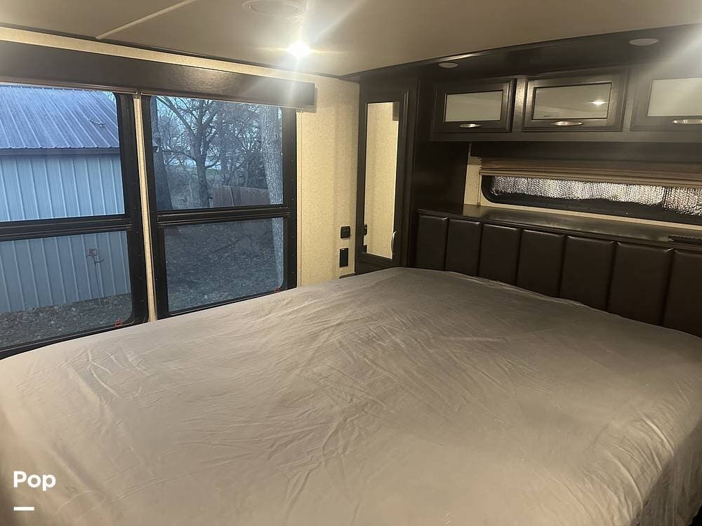 Call now about this 2017 Grand Design Momentum 376TH! 2017 Grand Design Momentum 376TH - Used Toy Hauler For Sale by Pop RVs in Beatrice, Nebraska features Slideout, Awning, Air Conditioning, Leveling Jacks, Generator