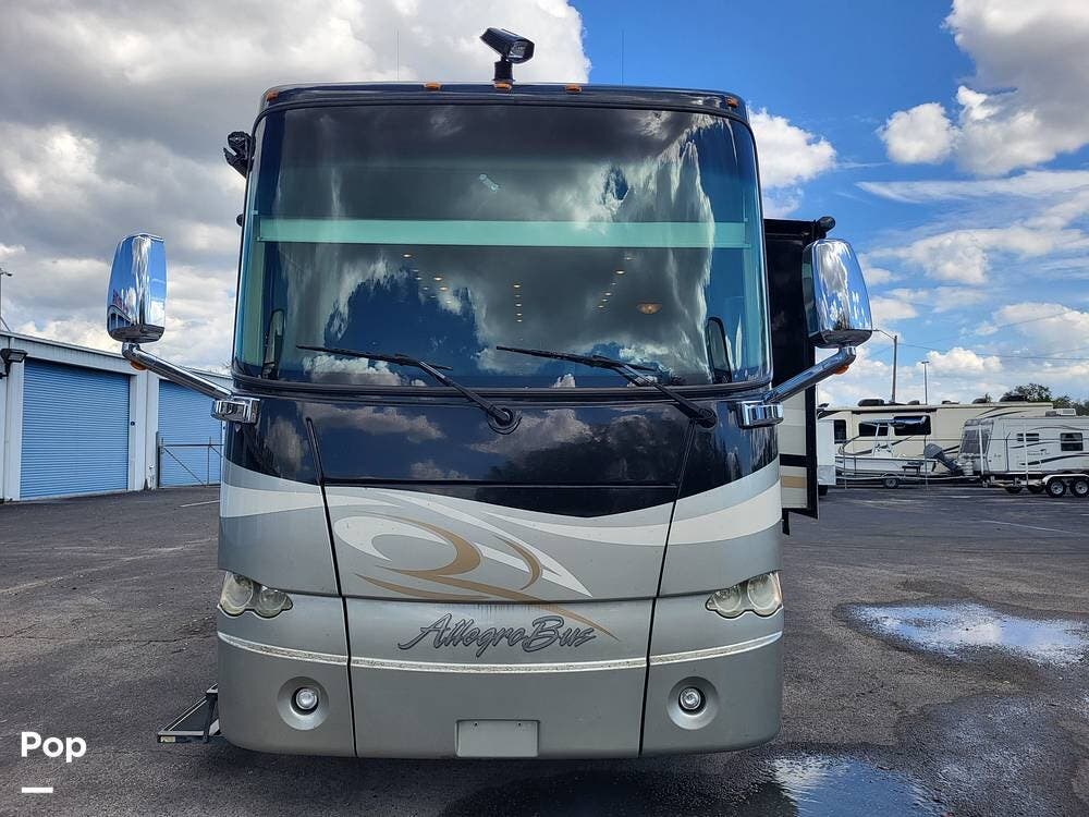 Call now about this 2011 Tiffin Allegro Bus 43QGP! 2011 Tiffin Allegro Bus 43QGP - Used Diesel Pusher For Sale by Pop RVs in Winter Garden, Florida features Slideout, Air Conditioning, Generator, Awning, Leveling Jacks