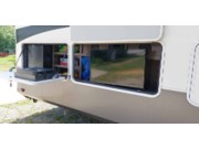 Call now about this 2018 Grand Design Solitude 374TH! 2018 Grand Design Solitude 374TH - Used Toy Hauler For Sale by Pop RVs in Linden, Michigan features Leveling Jacks, Awning, Slideout, Air Conditioning