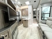 Call now about this 2023 Grand Design Momentum 320G Toy Hauler! 2023 Grand Design Momentum 320G Toy Hauler - Used Toy Hauler For Sale by Pop RVs in Niceville, Florida features Awning, Leveling Jacks, Slideout, Air Conditioning