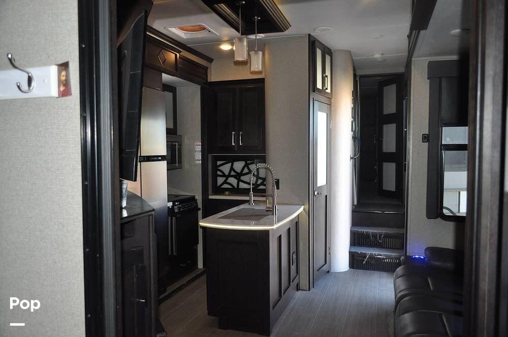 Call now about this 2018 Keystone Raptor 398TS! 2018 Keystone Raptor 398TS - Used Toy Hauler For Sale by Pop RVs in Kingman, Arizona features Generator, Awning, Air Conditioning, Slideout, Leveling Jacks