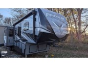 Call now about this 2021 Keystone Raptor 413! 2021 Keystone Raptor 413 - Used Toy Hauler For Sale by Pop RVs in Marion, Indiana features Slideout, Awning, Leveling Jacks, Generator, Air Conditioning