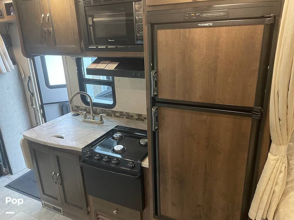 Call now about this 2019 Coachmen Prism 2150CB! 2019 Coachmen Prism 2150CB - Used Class C For Sale by Pop RVs in Pinckney, Michigan features Air Conditioning, Generator, Slideout, Awning