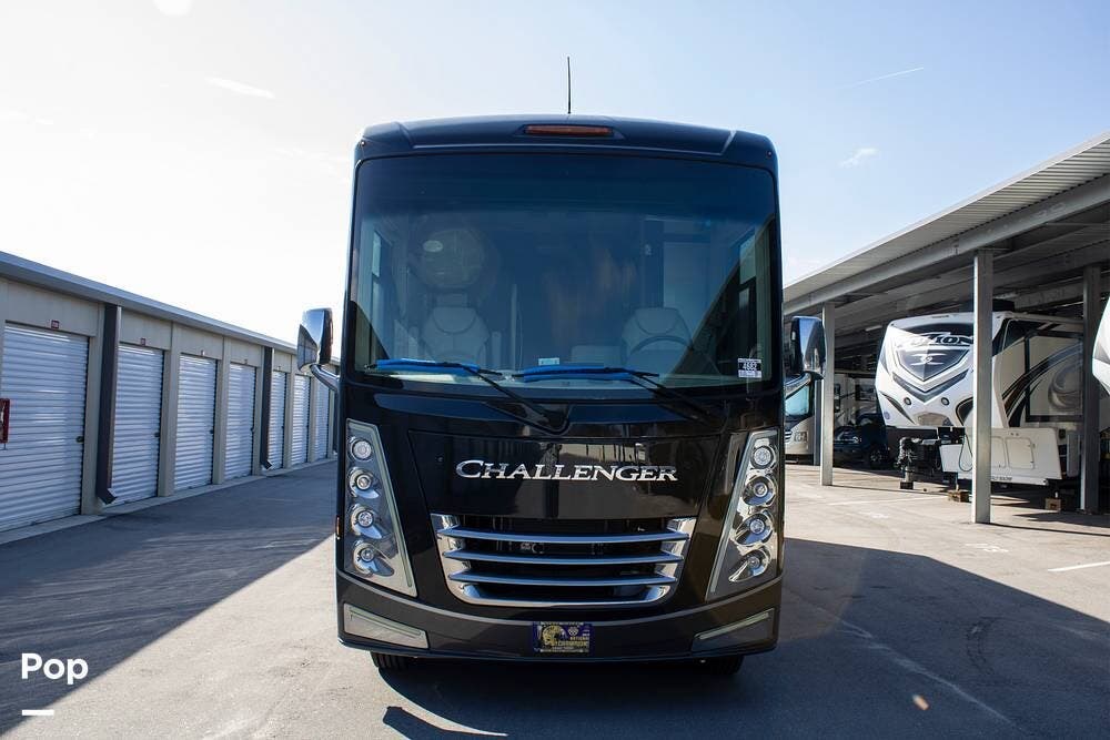Call now about this 2022 Thor Motor Coach Challenger 37DS! 2022 Thor Motor Coach Challenger 37DS - Used Class A For Sale by Pop RVs in Auburndale, Florida features Generator, Air Conditioning, Leveling Jacks, Slideout, Awning