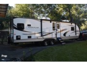 Call now about this 2021 Keystone Cougar 30RKD! 2021 Keystone Cougar 30RKD - Used Travel Trailer For Sale by Pop RVs in Pace, Florida features Awning, Air Conditioning, Leveling Jacks, Slideout
