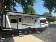 Call now about this 2023 Keystone Outback 271UFK! 2023 Keystone Outback 271UFK - Used Travel Trailer For Sale by Pop RVs in Horicon, Wisconsin features Leveling Jacks, Awning, Air Conditioning, Slideout