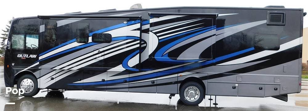 Call now about this 2023 Thor Motor Coach Outlaw 38KB! 2023 Thor Motor Coach Outlaw 38KB - Used Toy Hauler For Sale by Pop RVs in Geneva-on-the-lake, Ohio features Air Conditioning, Awning, Slideout, Leveling Jacks, Generator