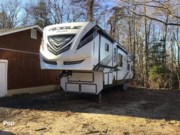 Call now about this 2021 Forest River Rogue 371A13! 2021 Forest River Rogue 371A13 - Used Toy Hauler For Sale by Pop RVs in Prince Frederick, Maryland features Generator, Awning, Leveling Jacks, Slideout, Air Conditioning