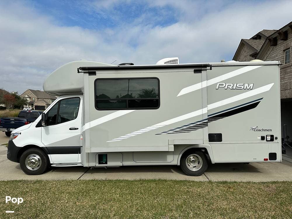 Call now about this 2021 Coachmen Prism 24CB! 2021 Coachmen Prism 24CB - Used Class C For Sale by Pop RVs in League City, Texas features Slideout, Awning, Air Conditioning, Generator