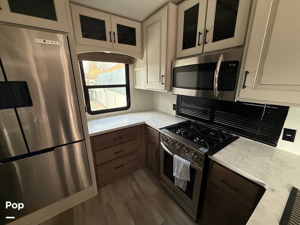 Call now about this 2023 Alliance RV Paradigm 382RK! 2023 Alliance RV Paradigm 382RK - Used Fifth Wheel For Sale by Pop RVs in Grantsville, Utah features Air Conditioning, Slideout, Awning, Leveling Jacks